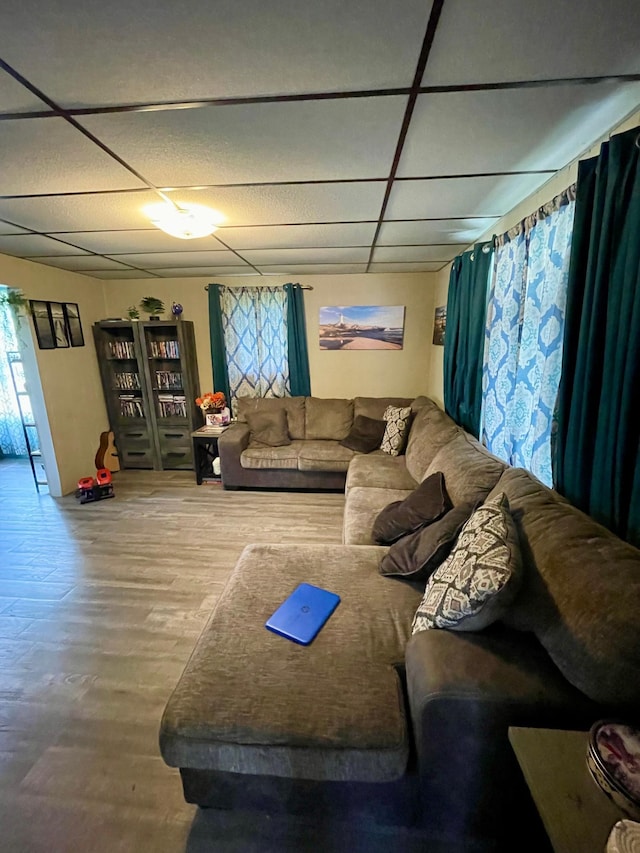 506 3rd St SW, Wadena, MN 56482 - living area with a paneled ceiling and wood finished floors