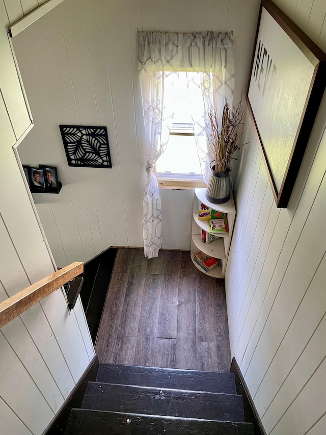 506 3rd St SW, Wadena, MN 56482 - stairway with wood finished floors and wood walls