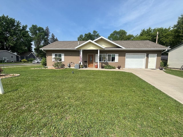 420 14th St, Brainerd, MN 56401 - view of front facade with an attached garage, concrete driveway, a front yard, and covered porch