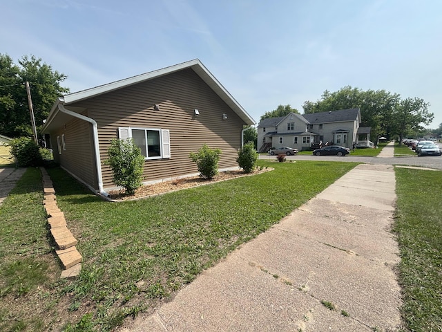 420 14th St, Brainerd, MN 56401 - view of side of property with a yard