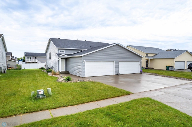 1131 38 1/2 Ave W, West Fargo, ND 58078 - traditional-style house with an attached garage and driveway