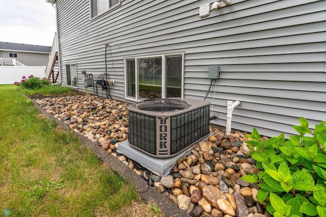 1131 38 1/2 Ave W, West Fargo, ND 58078 - exterior view of a central air condition unit and stairs