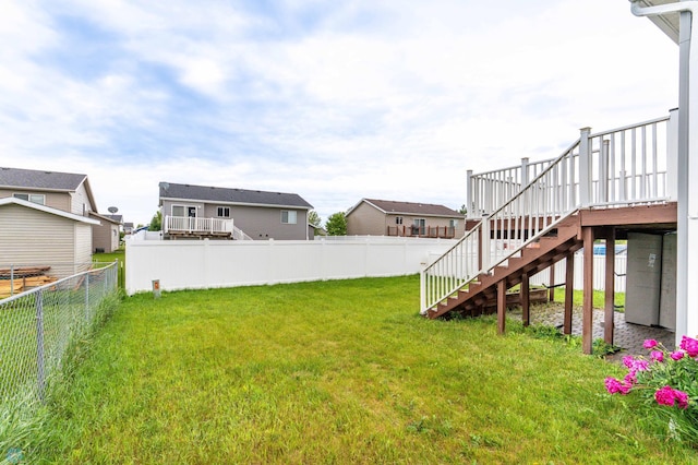 1131 38 1/2 Ave W, West Fargo, ND 58078 - fenced backyard with stairway