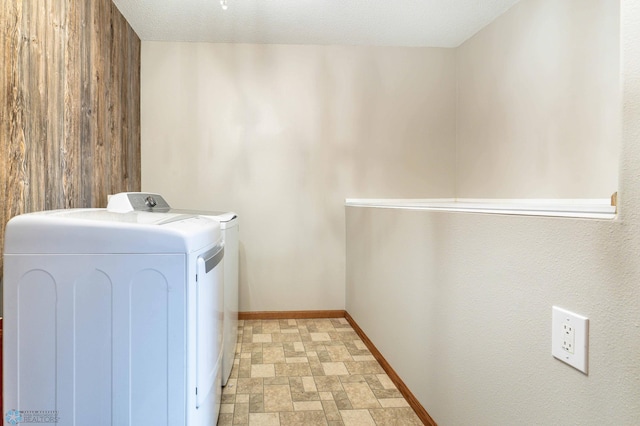 1131 38 1/2 Ave W, West Fargo, ND 58078 - laundry area featuring independent washer and dryer and baseboards