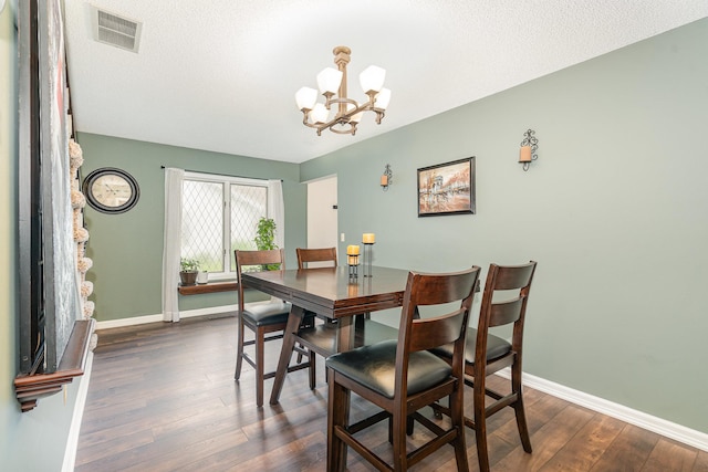 12233 191st Ave NW, Elk River, MN 55330 - dining area featuring a chandelier, dark wood finished floors, and baseboards