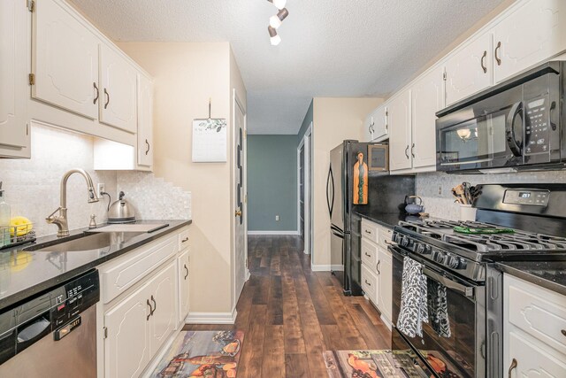 12233 191st Ave NW, Elk River, MN 55330 - kitchen with black appliances, a sink, white cabinetry, decorative backsplash, and a textured ceiling