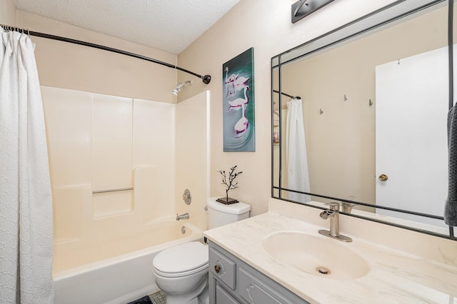 12233 191st Ave NW, Elk River, MN 55330 - bathroom featuring vanity, toilet, shower / tub combo with curtain, and a textured ceiling