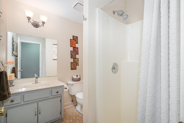 12233 191st Ave NW, Elk River, MN 55330 - bathroom featuring toilet, vanity, curtained shower, and baseboards