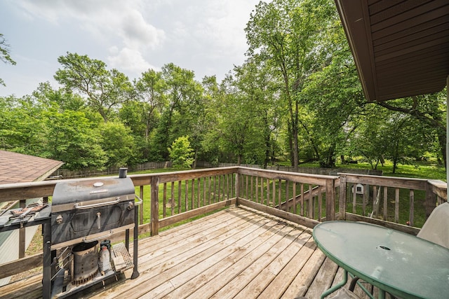 42174 Bur Oak Hills Loop, Pelican Twp, MN 56572 - deck with a grill and a fenced backyard