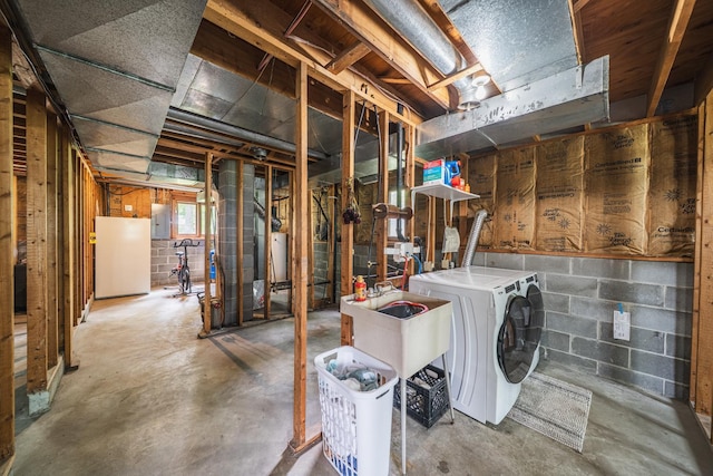 42174 Bur Oak Hills Loop, Pelican Twp, MN 56572 - basement with electric panel, gas water heater, washer and clothes dryer, freestanding refrigerator, and concrete block wall