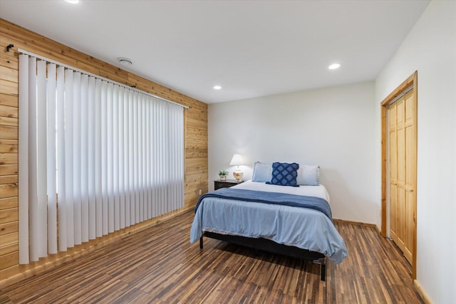 32305 Little E Lake Rd, Bigfork, MN 56628 - bedroom featuring wood finished floors, recessed lighting, baseboards, and wooden walls