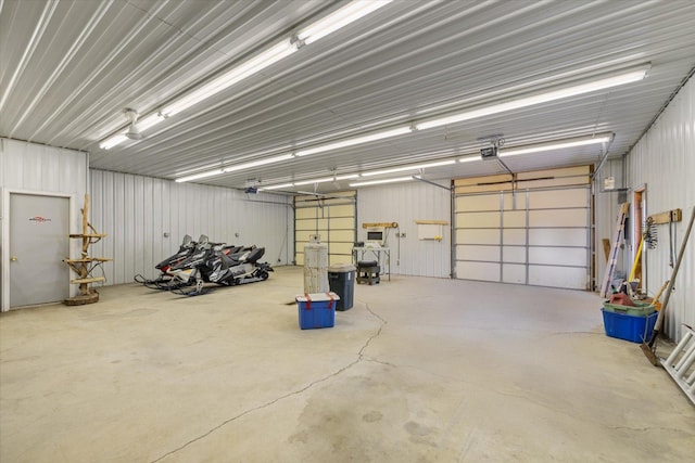 32305 Little E Lake Rd, Bigfork, MN 56628 - garage featuring a garage door opener