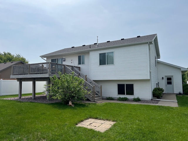 728 7th St, Litchfield, MN 55355 - back of house with a wooden deck, stairway, and a yard