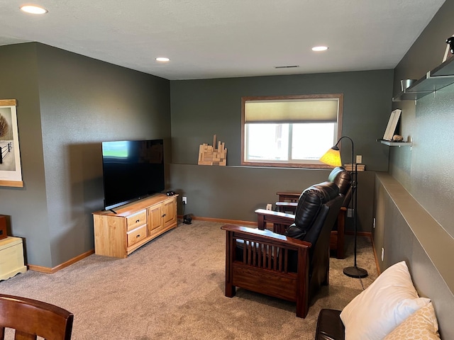 728 7th St, Litchfield, MN 55355 - living room featuring light carpet, baseboards, and recessed lighting