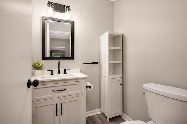 4839 Spring Cir, Minnetonka, MN 55345 - half bath featuring vanity and wood finished floors