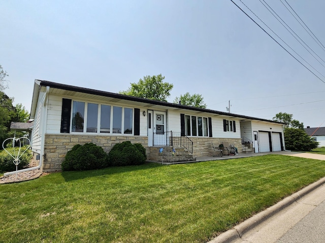 25 3rd Ave NE, Plainview, MN 55964 - ranch-style home with stone siding, a garage, a front yard, and concrete driveway