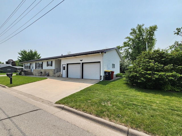 25 3rd Ave NE, Plainview, MN 55964 - single story home with a garage, concrete driveway, and a front lawn