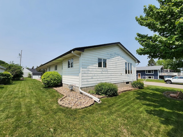 25 3rd Ave NE, Plainview, MN 55964 - view of home's exterior with a lawn
