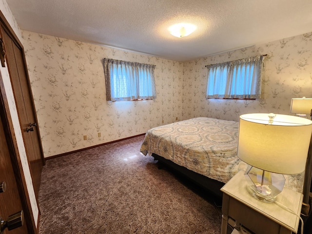 25 3rd Ave NE, Plainview, MN 55964 - bedroom featuring a textured ceiling and carpet