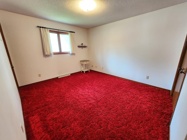 25 3rd Ave NE, Plainview, MN 55964 - spare room with dark colored carpet and a textured ceiling