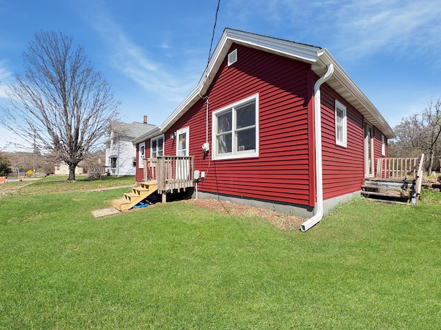 20 1st St, Luck, WI 54853 - view of home's exterior with a yard
