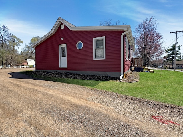 20 1st St, Luck, WI 54853 - view of side of property with a yard