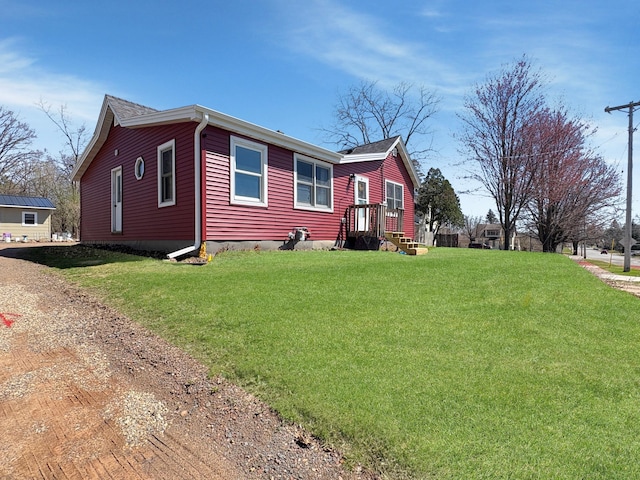 20 1st St, Luck, WI 54853 - view of front of house featuring a front lawn