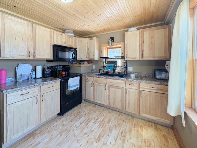 20 1st St, Luck, WI 54853 - kitchen with black appliances, light brown cabinets, light wood finished floors, a sink, and ornamental molding