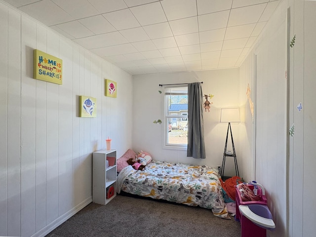 20 1st St, Luck, WI 54853 - bedroom with carpet floors and wood walls