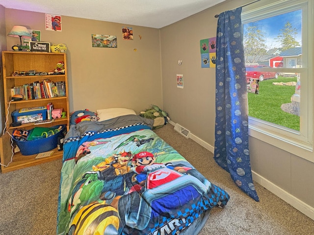 20 1st St, Luck, WI 54853 - carpeted bedroom with baseboards