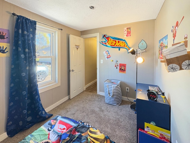 20 1st St, Luck, WI 54853 - rec room featuring carpet and a textured ceiling