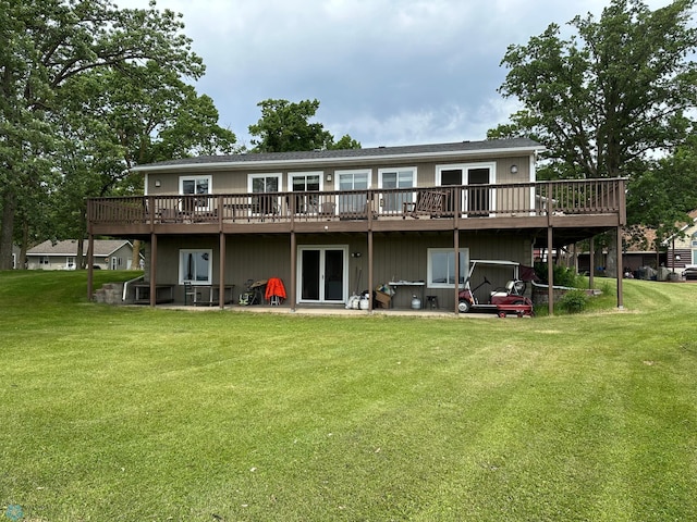 44556 Mcgowan Estates Rd, Rush Lake Twp, MN 56571 - rear view of house featuring a deck, a yard, and a patio area
