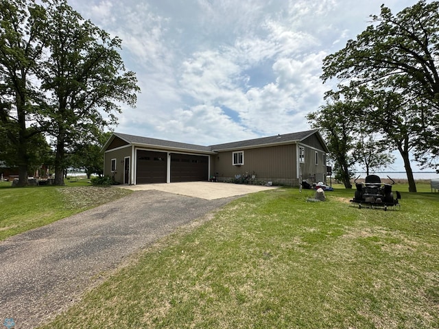 44556 Mcgowan Estates Rd, Rush Lake Twp, MN 56571 - view of front facade featuring a garage, driveway, and a front yard