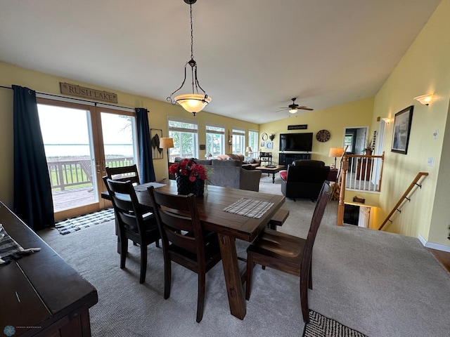 44556 Mcgowan Estates Rd, Rush Lake Twp, MN 56571 - dining area with vaulted ceiling, carpet flooring, and a ceiling fan