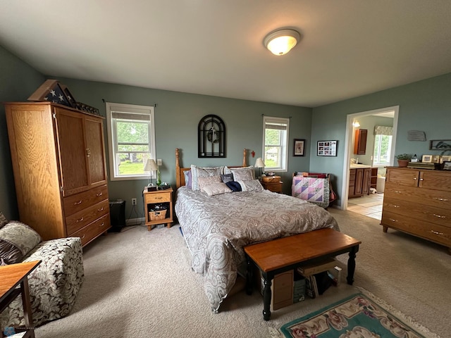 44556 Mcgowan Estates Rd, Rush Lake Twp, MN 56571 - bedroom with light colored carpet, multiple windows, and ensuite bath