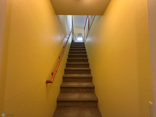 44556 Mcgowan Estates Rd, Rush Lake Twp, MN 56571 - stairway with a textured wall