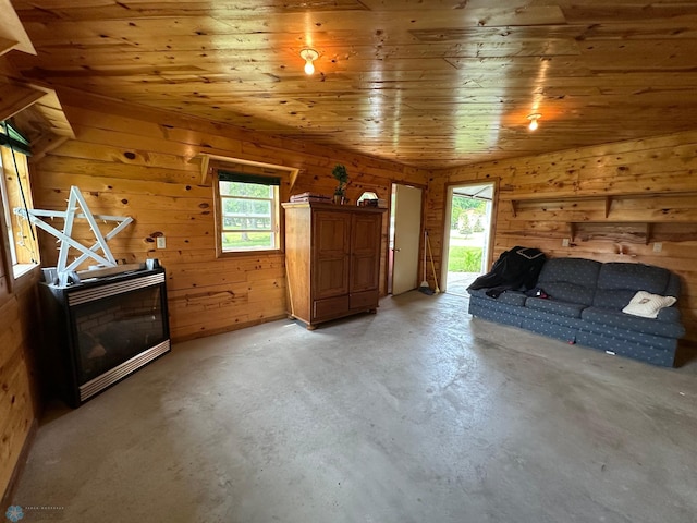 44556 Mcgowan Estates Rd, Rush Lake Twp, MN 56571 - bedroom featuring unfinished concrete flooring, wood ceiling, wood walls, and access to outside