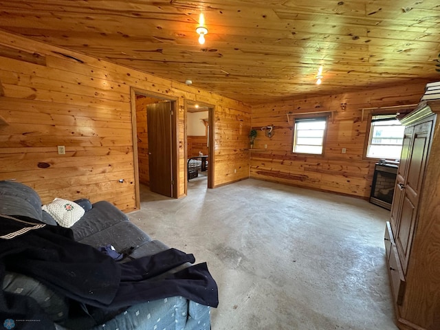44556 Mcgowan Estates Rd, Rush Lake Twp, MN 56571 - unfurnished living room with wooden walls, wooden ceiling, and concrete flooring
