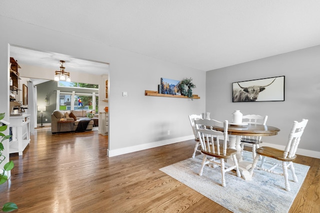 15350 Drexel Way, Apple Valley, MN 55124 - dining space with wood finished floors and a chandelier