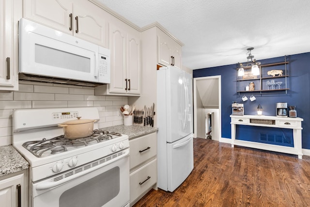 15350 Drexel Way, Apple Valley, MN 55124 - kitchen featuring white appliances, white cabinets, tasteful backsplash, dark wood-style floors, and a textured ceiling