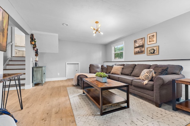 15350 Drexel Way, Apple Valley, MN 55124 - living room featuring light wood-style flooring, stairs, and a chandelier