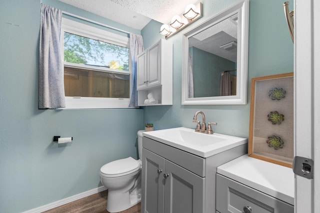 15350 Drexel Way, Apple Valley, MN 55124 - bathroom featuring vanity, a textured ceiling, wood finished floors, and a shower with shower curtain