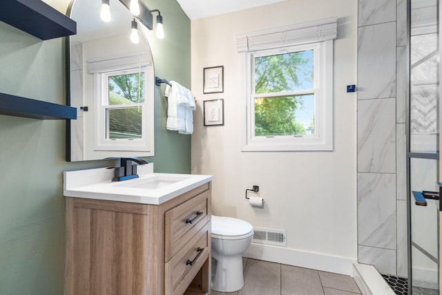 15350 Drexel Way, Apple Valley, MN 55124 - full bathroom with vanity, a walk in shower, and tile patterned floors