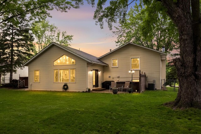 15350 Drexel Way, Apple Valley, MN 55124 - back of property at dusk with a lawn