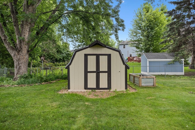 15350 Drexel Way, Apple Valley, MN 55124 - view of shed featuring a fenced backyard