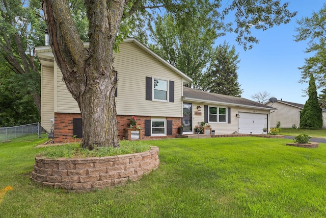 15350 Drexel Way, Apple Valley, MN 55124 - split level home with an attached garage and brick siding