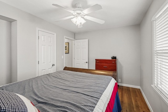 611 Sumter Ave S, Golden Valley, MN 55426 - bedroom featuring wood finished floors, multiple windows, and ceiling fan