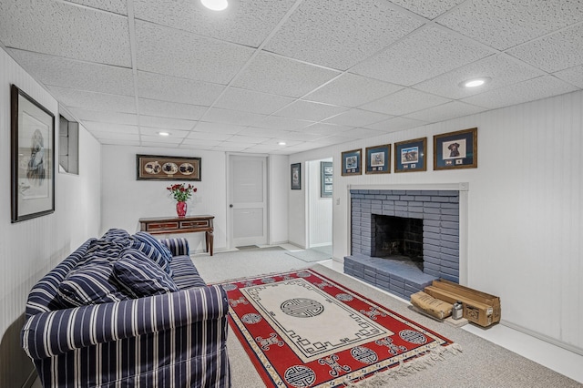 611 Sumter Ave S, Golden Valley, MN 55426 - carpeted living area featuring a paneled ceiling, a brick fireplace, and recessed lighting