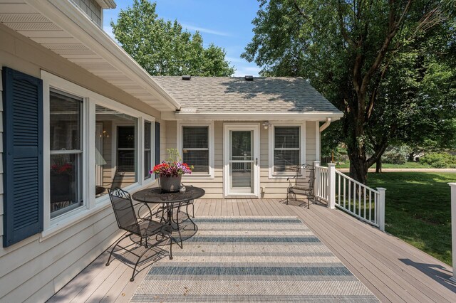 611 Sumter Ave S, Golden Valley, MN 55426 - wooden terrace with a lawn