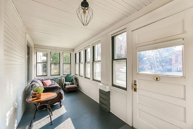 1311 Monroe St NE, Minneapolis, MN 55413 - sunroom / solarium featuring wood finished floors